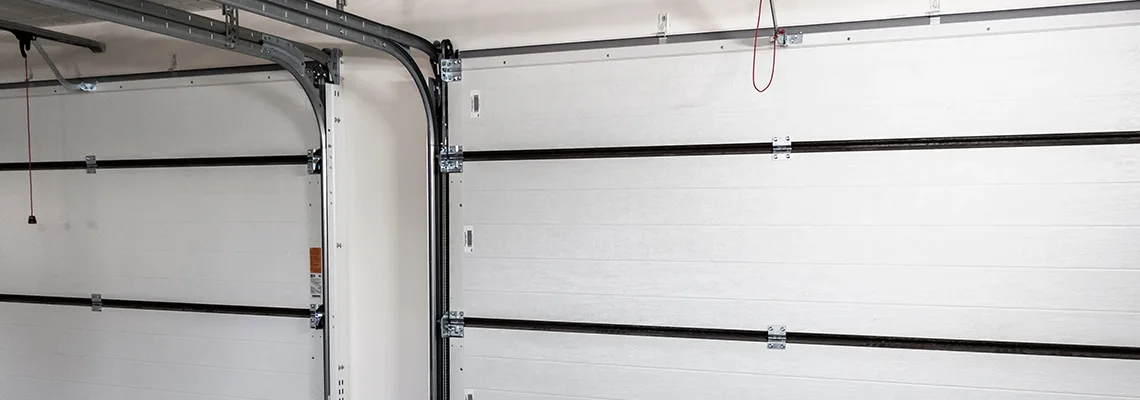 Fix Folding Garage Door Jerking in Elk Grove Village, Illinois