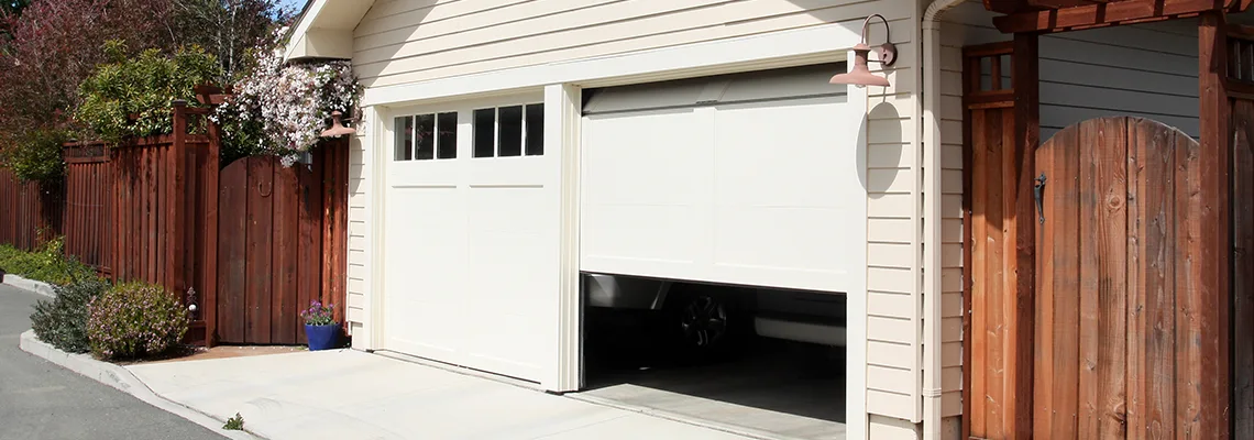 Fix Metal Garage Door Jerking in Elk Grove Village, Illinois